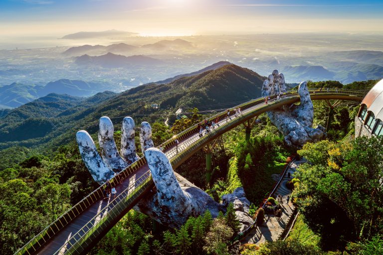 Tourist,Walking,At,Golden,Bridge,In,Bana,Hills,,Da,Nang,