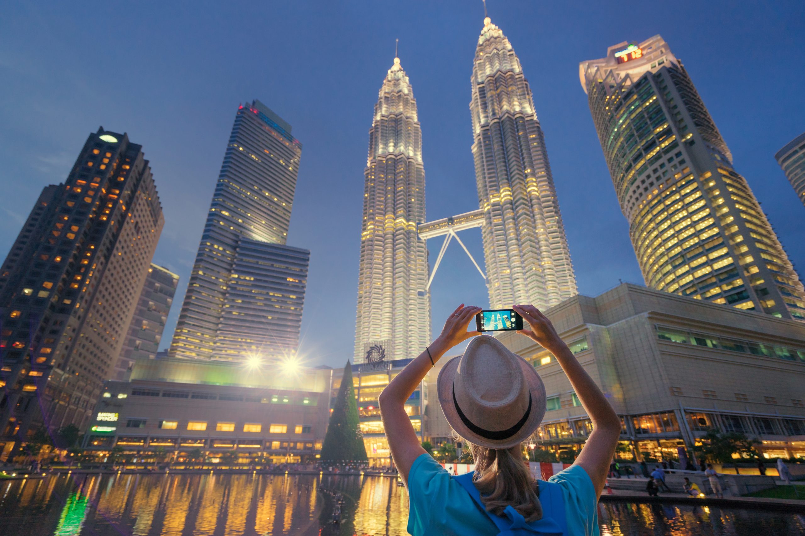 Travel,And,Technology.,Young,Woman,Taking,Photo,With,Her,Smartphone