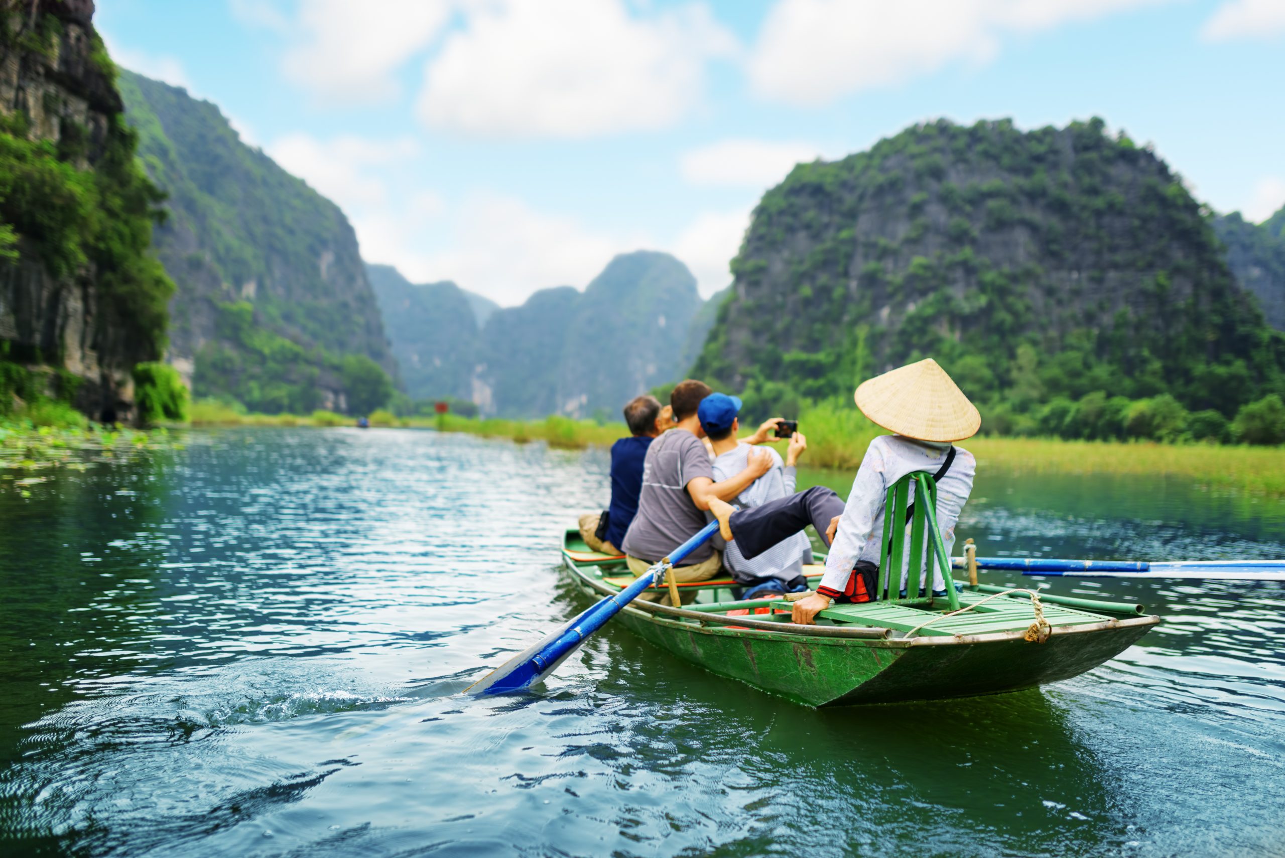 Tourists,Traveling,In,Boat,Along,The,Ngo,Dong,River,And