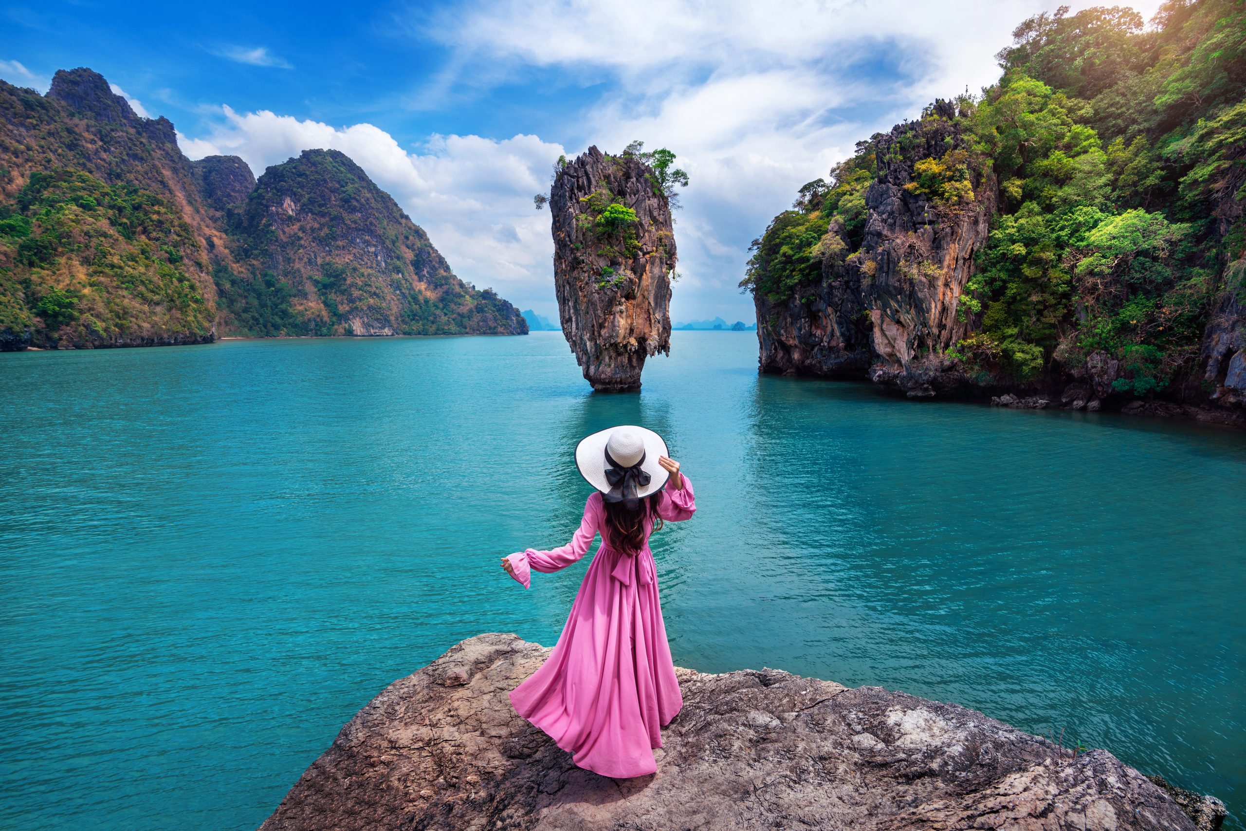 Beautiful,Girl,Standing,On,The,Rock,At,James,Bond,Island