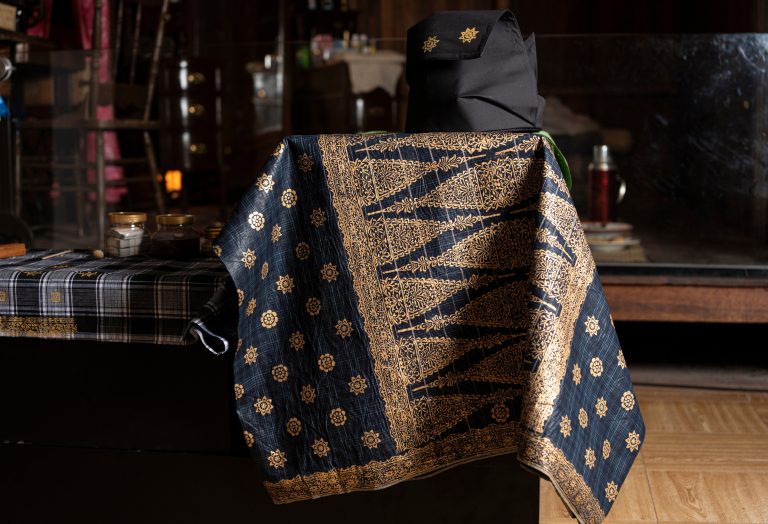 Close-up,Of,Traditional,Malay,Kain,Telepuk,With,Golden,Motifs,On
