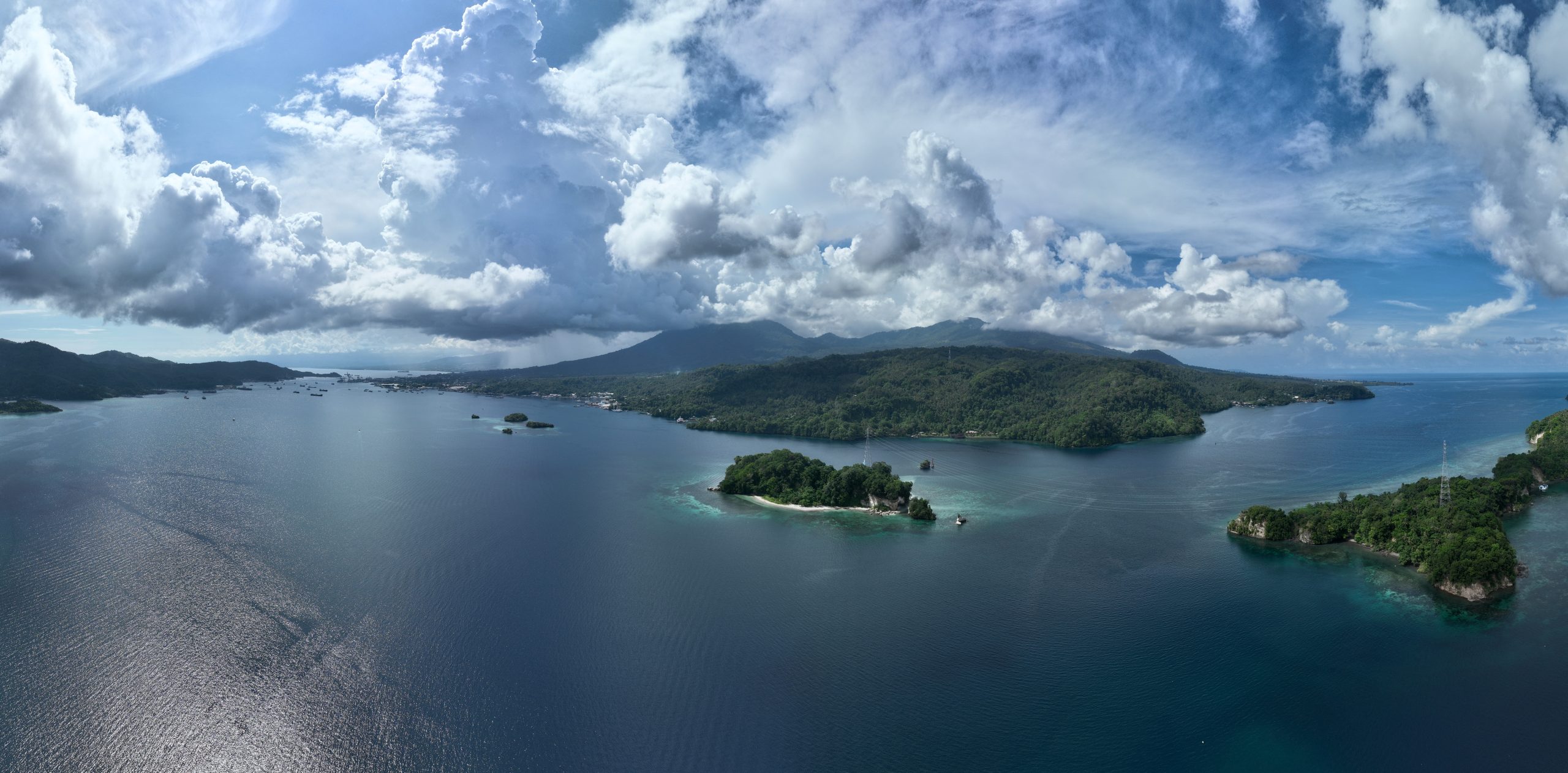Clouds,Drift,Above,Lembeh,Strait,,Separating,North,Sulawesi,From,Lembeh