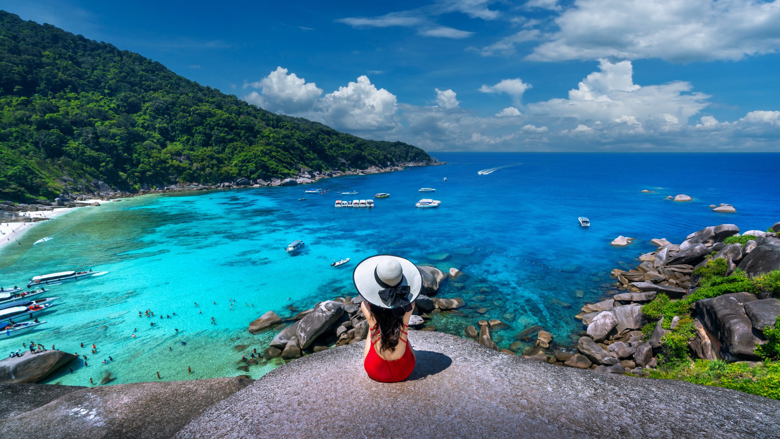 Beautiful,Girl,Sitting,On,The,Rock,At,Similan,Island,,Thailand.